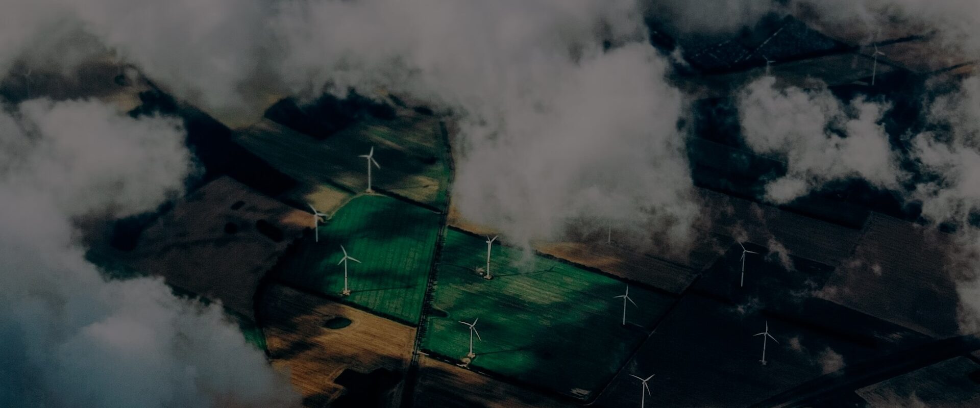 Aerial photograph of wind turbines generating renewable energy