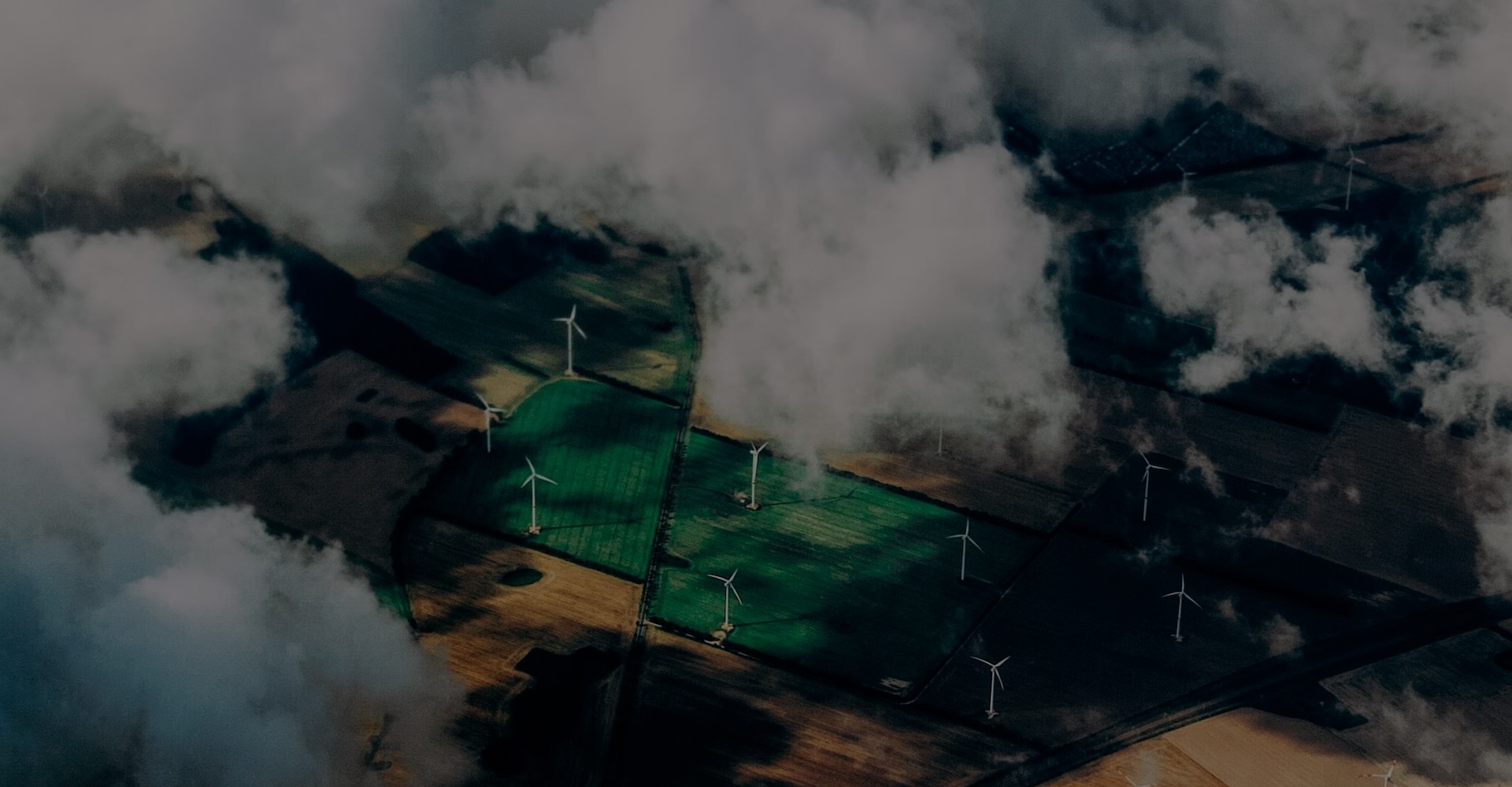 Aerial photograph of wind turbines generating renewable energy