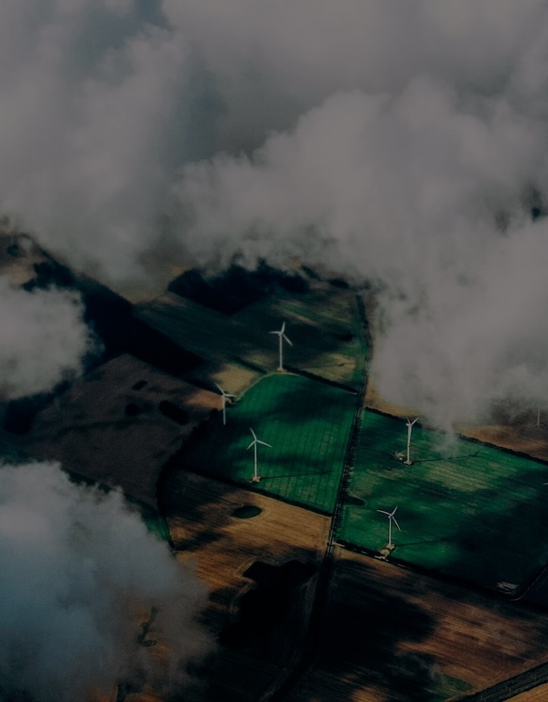 Aerial photograph of wind turbines generating renewable energy